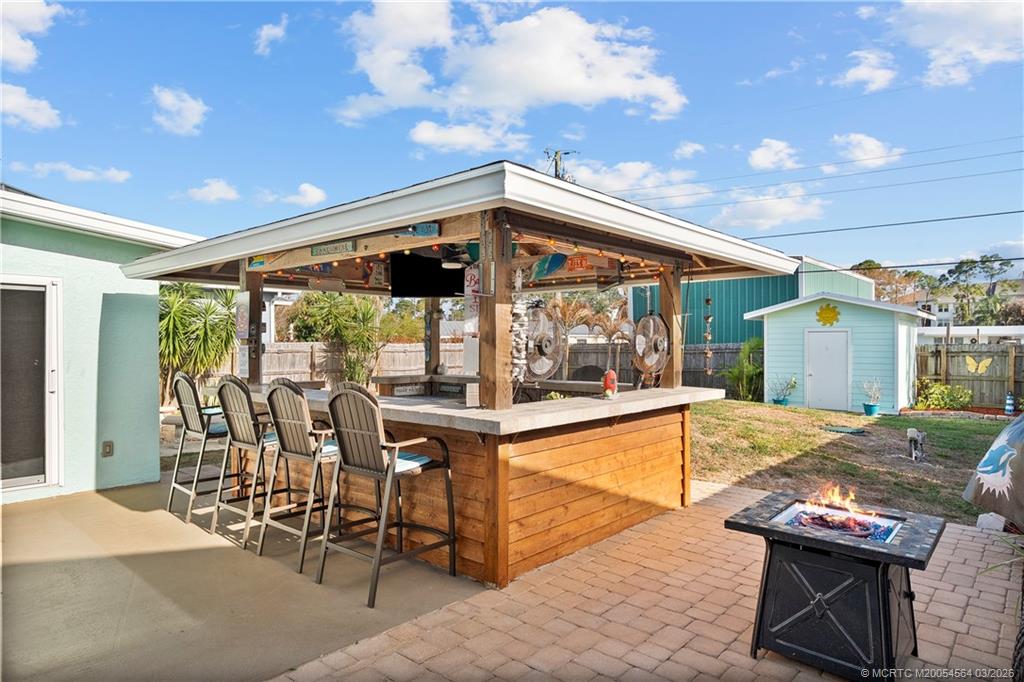 2602 Southeast Jackson Street Stuart, FL 34997 - Photo 33 of 53 a view of a patio with swimming pool