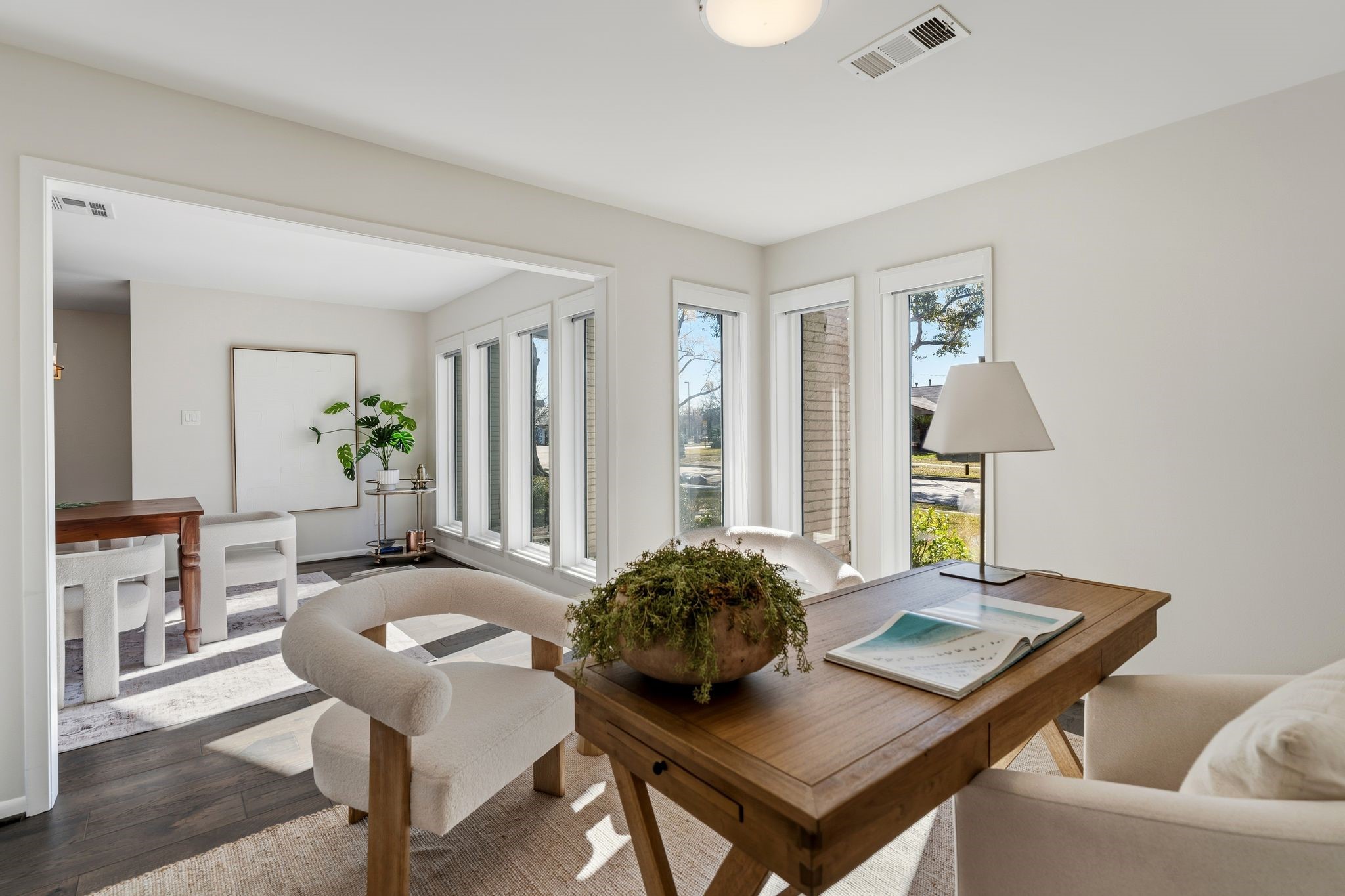 5706 Ariel Street Houston, TX 77096 - Photo 6 of 31 Currently styled as a home office, offering a semi-private and flexible space.