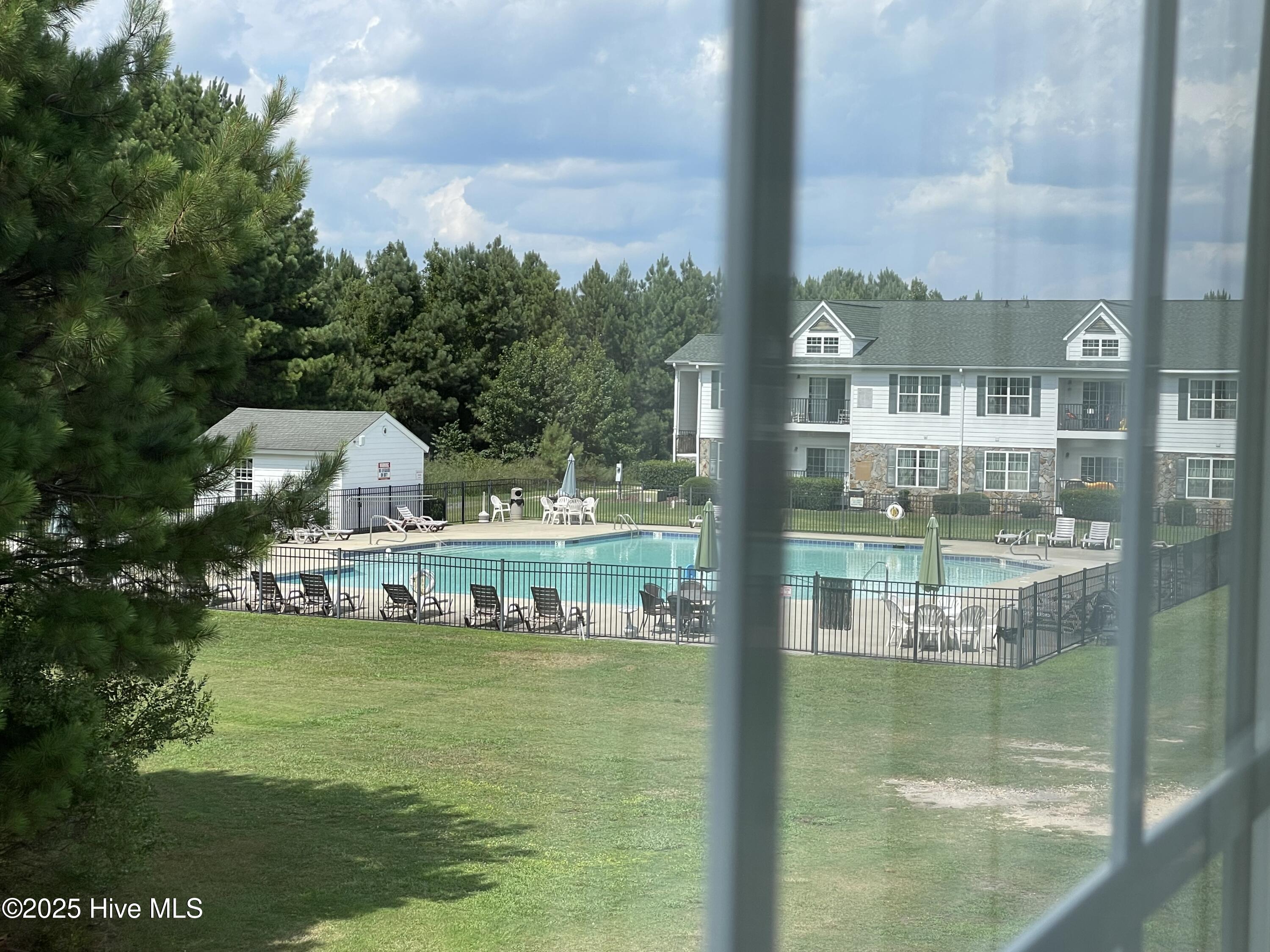 490 Little River Farm Boulevard, Unit A 201 Carthage, NC 28327 - Photo 3 of 19 A203 view to pool