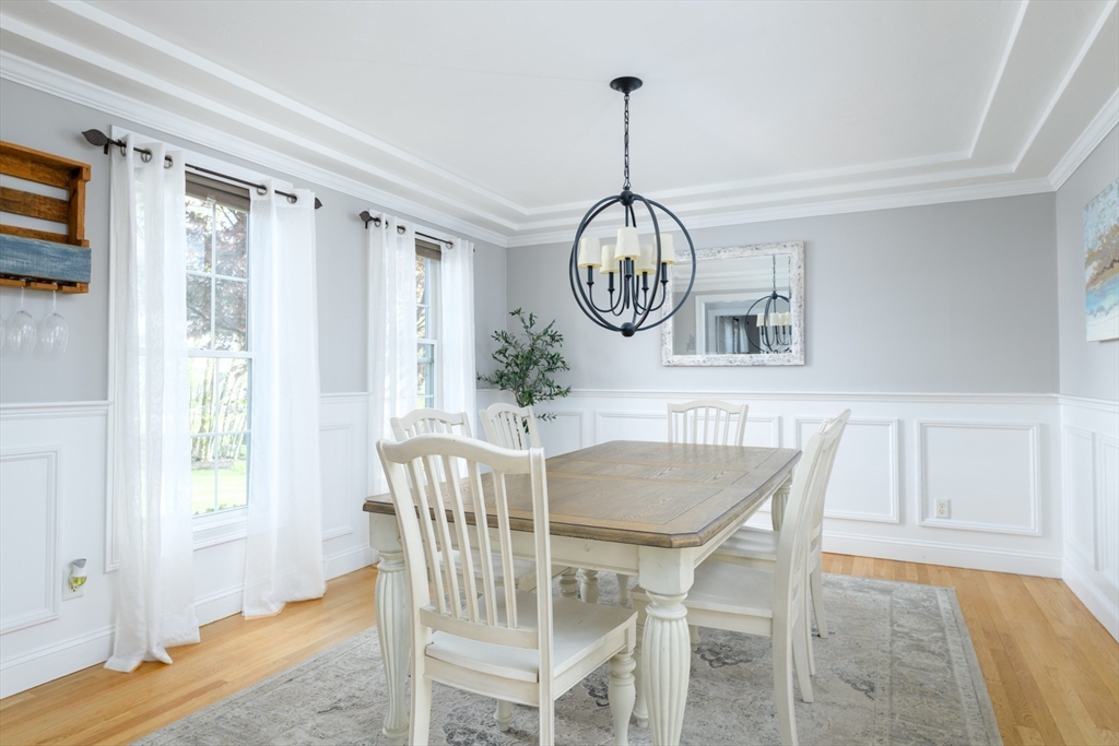 27 Vista Circle Rutland, MA 01543 - Photo 10 of 35 a view of a dining room with furniture window and wooden floor