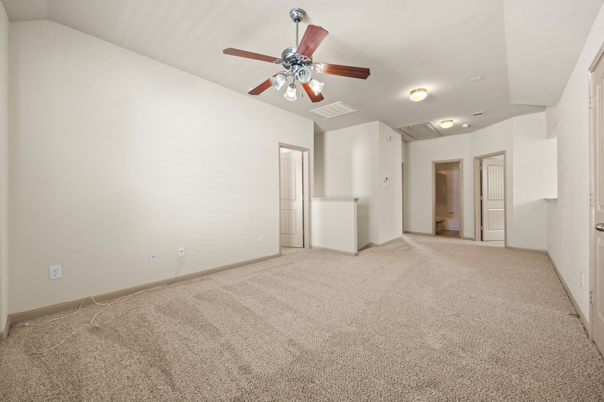 3606 Canvasback Lane Houston, TX 77047 - Photo 20 of 29 Another view of the spacious upstairs flex space, offering an open layout with abundant natural light and easy access to the secondary bedrooms.
