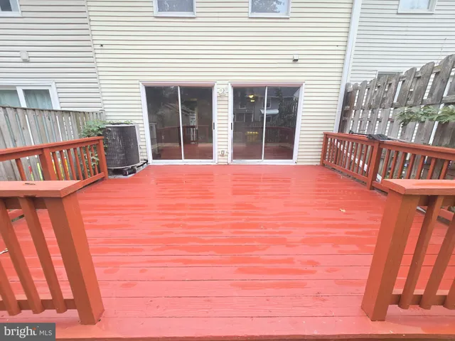 a view of a balcony with furniture