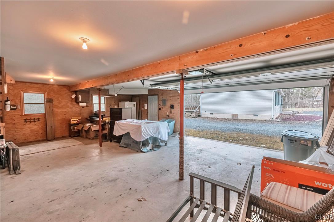 419 Merwinsburg Road Effort, PA 18330 - Photo 25 of 32 a bed room with furniture and a large window