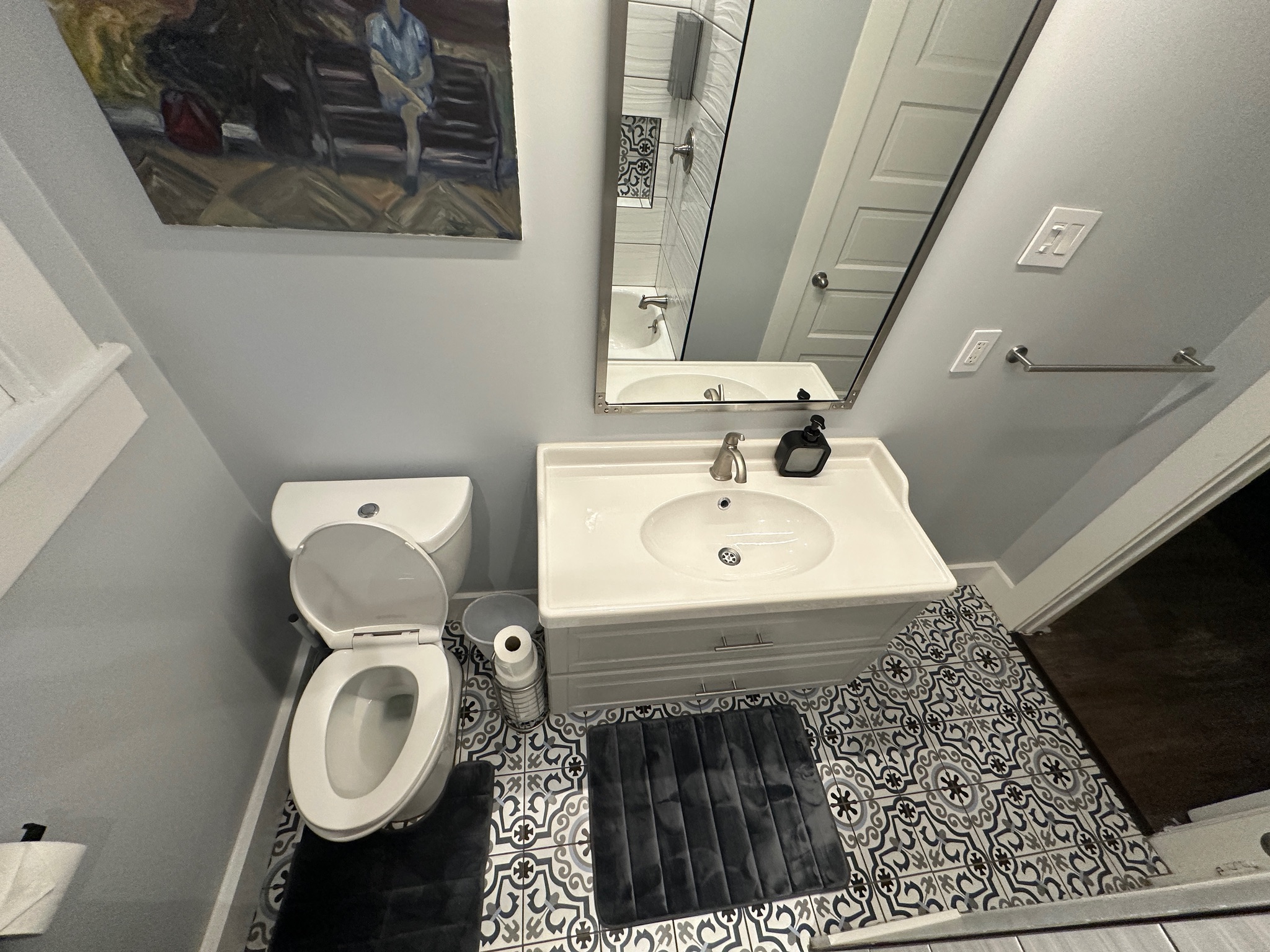3210 Hampton Road, Unit A B C Austin, TX 78705 - Photo 17 of 42 Half bath with tile patterned flooring and vanity