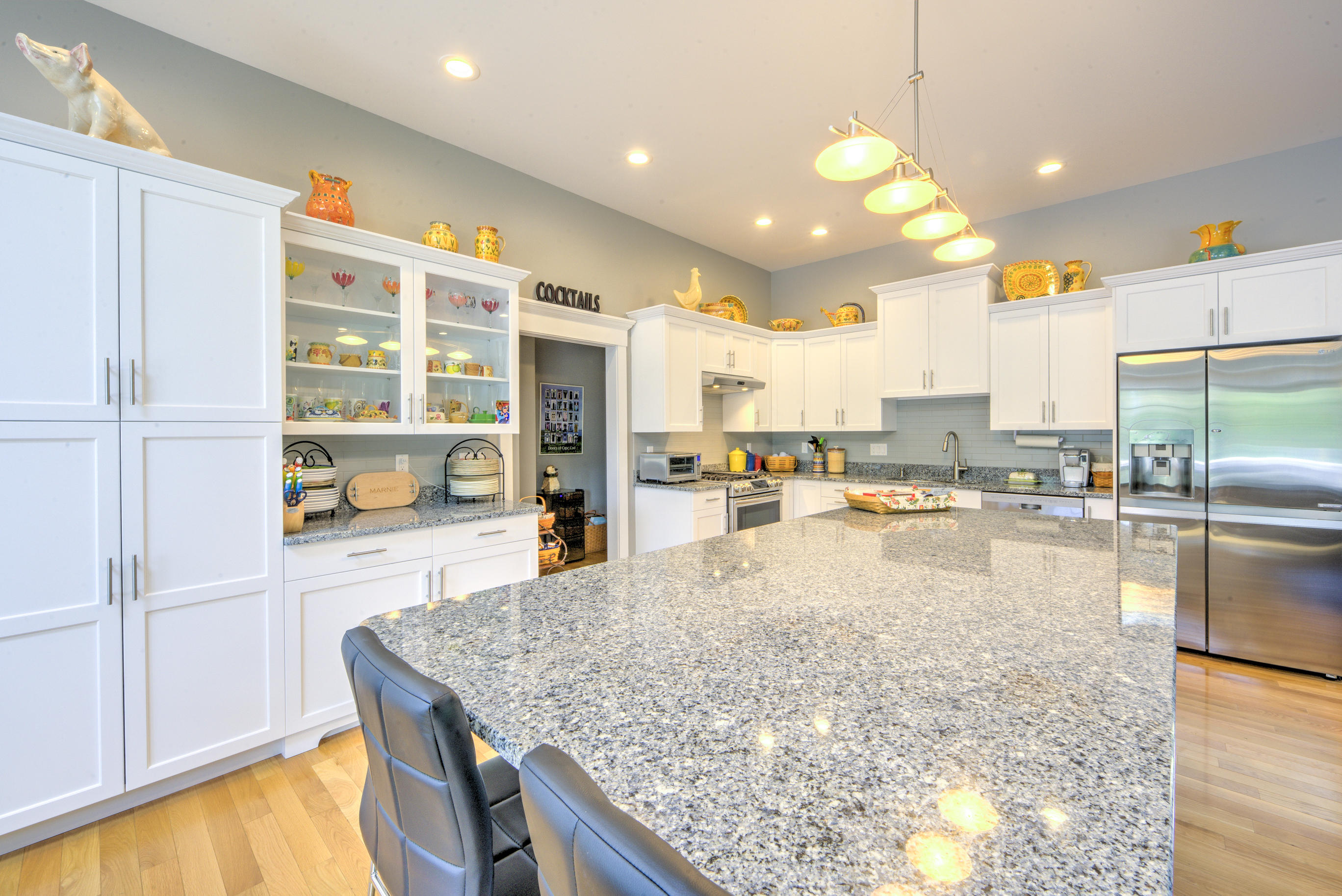 63 Joyce Anne Road Centerville, MA 02632 - Photo 16 of 35 a kitchen with stainless steel appliances granite countertop a sink counter space and cabinets