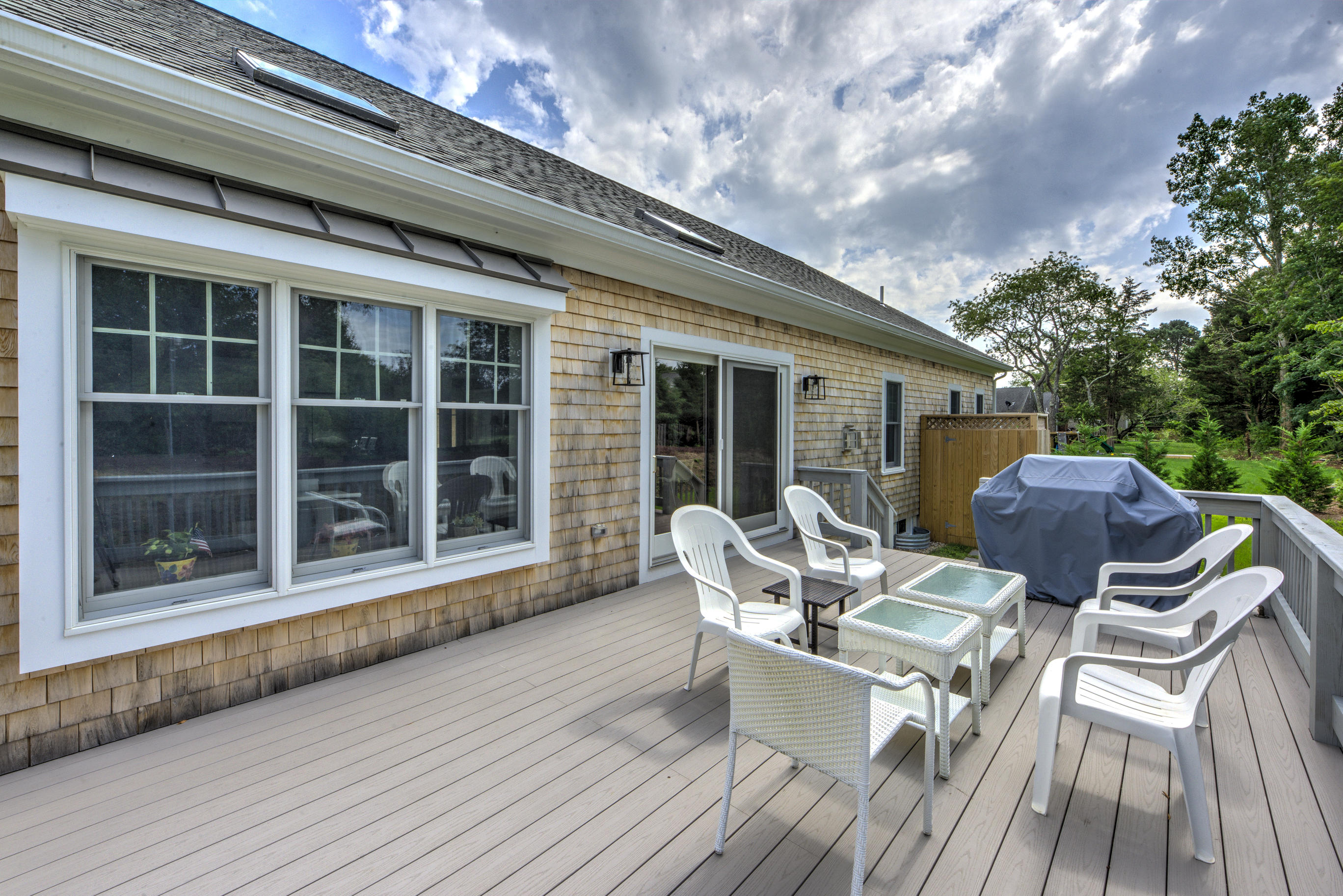63 Joyce Anne Road Centerville, MA 02632 - Photo 6 of 35 a view of a patio with table and chairs