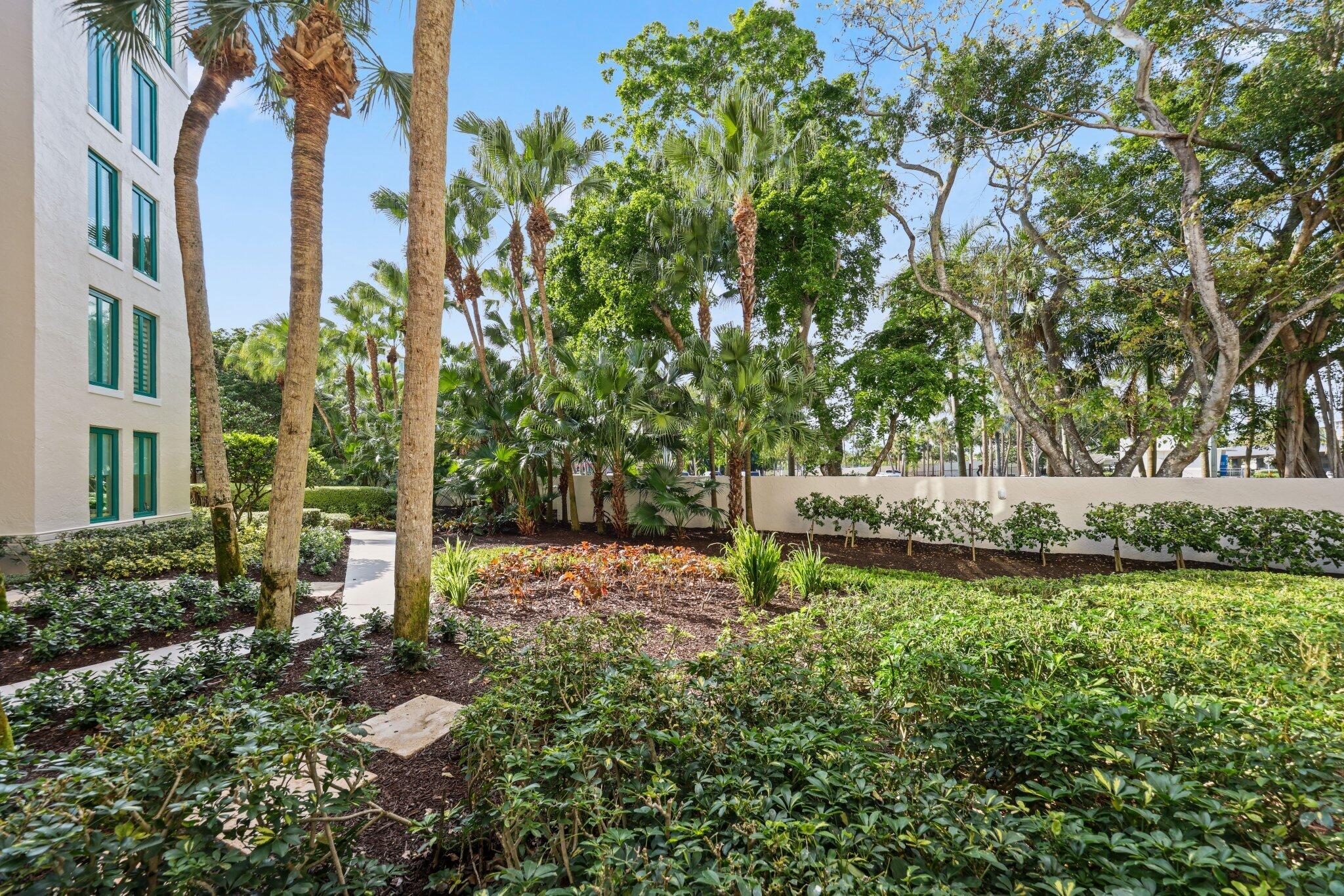 100 Southeast 5th Avenue, Unit 106 Boca Raton, FL 33432 - Photo 42 of 81 a view of a yard with plants and trees
