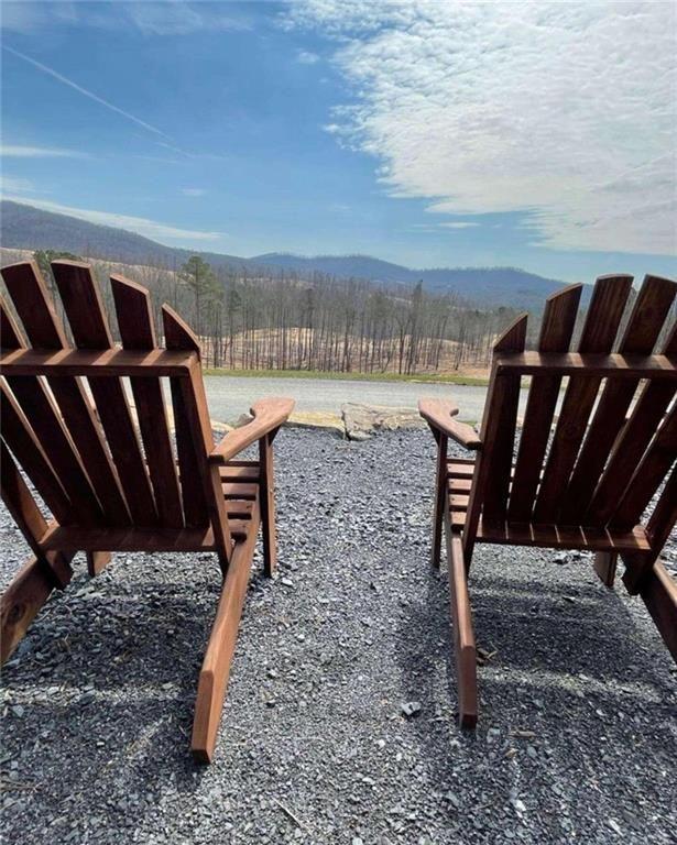 135 Twisted Oak Road Talking Rock, GA 30175 - Photo 15 of 27 a view of a backyard with chairs