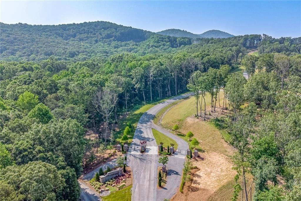 135 Twisted Oak Road Talking Rock, GA 30175 - Photo 18 of 27 an aerial view of a house with a yard