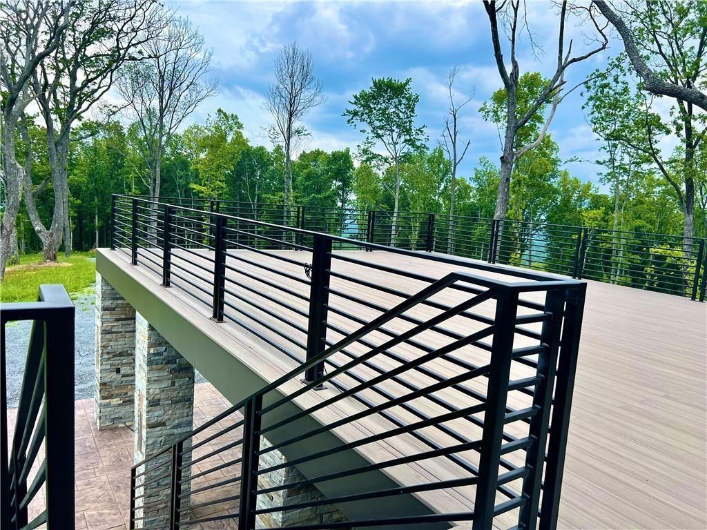 135 Twisted Oak Road Talking Rock, GA 30175 - Photo 20 of 27 a view of a backyard with a deck