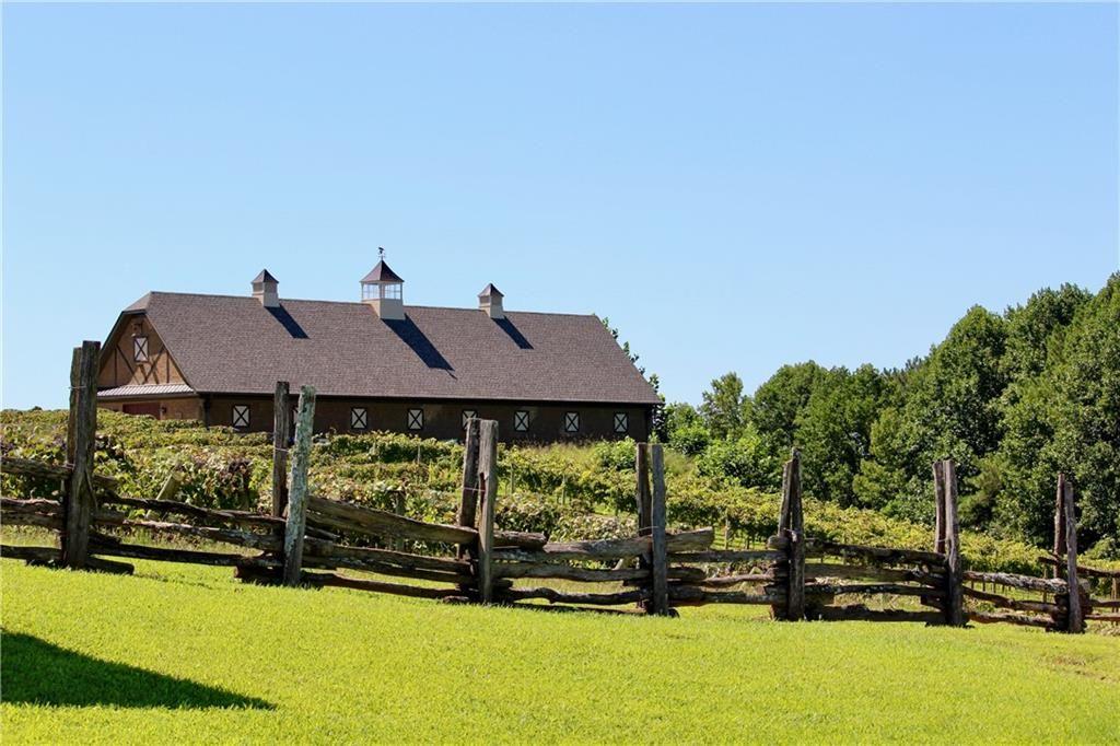 135 Twisted Oak Road Talking Rock, GA 30175 - Photo 5 of 27 a front view of a house with a yard