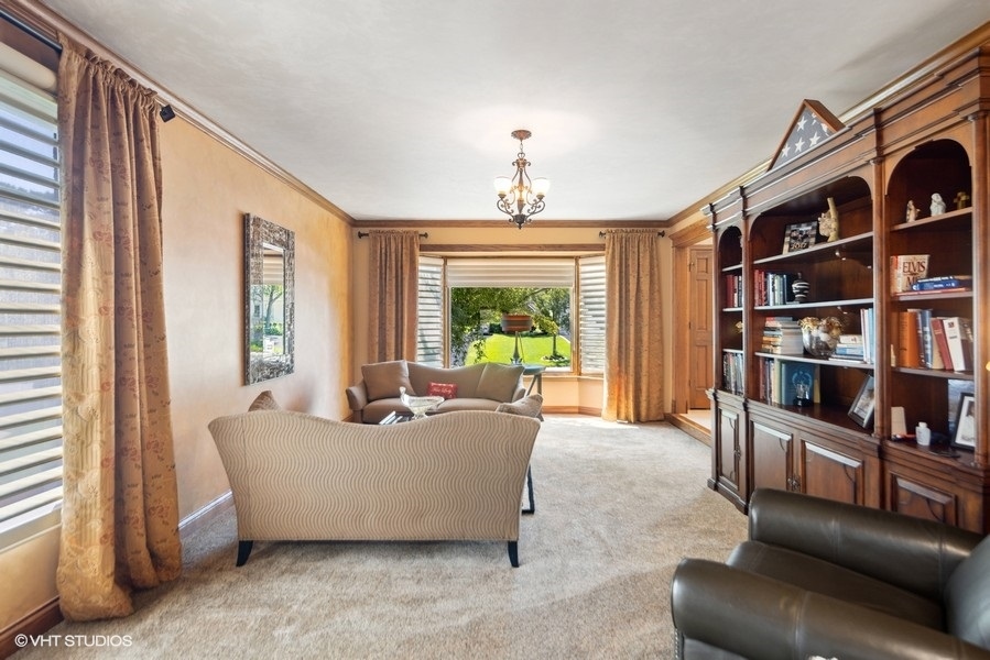 467 81st Street Burr Ridge, IL 60527 - Photo 13 of 45 a living room with furniture and a window