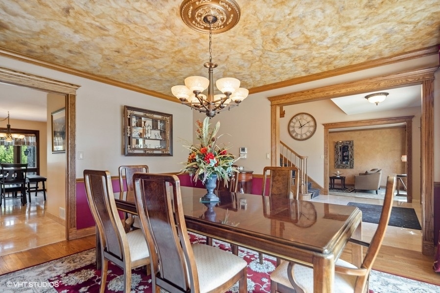 467 81st Street Burr Ridge, IL 60527 - Photo 22 of 45 a view of a dining room with furniture and chandelier