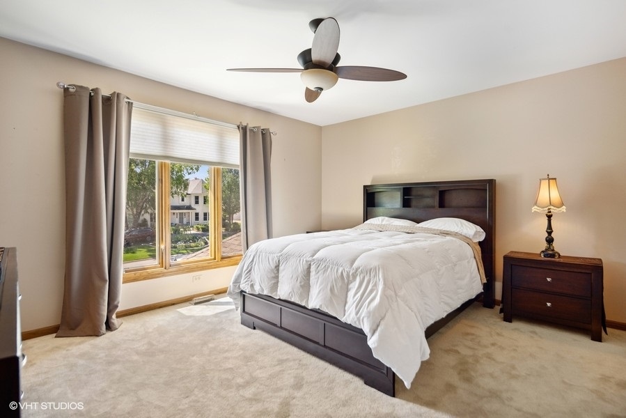 467 81st Street Burr Ridge, IL 60527 - Photo 28 of 45 a bed room with a bed and a large window