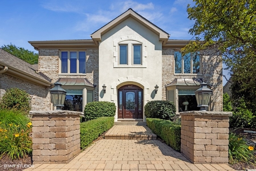 467 81st Street Burr Ridge, IL 60527 - Photo 3 of 45 a front view of a house with yard