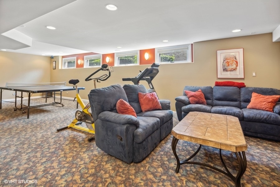 467 81st Street Burr Ridge, IL 60527 - Photo 36 of 45 a living room with furniture and a wooden floor