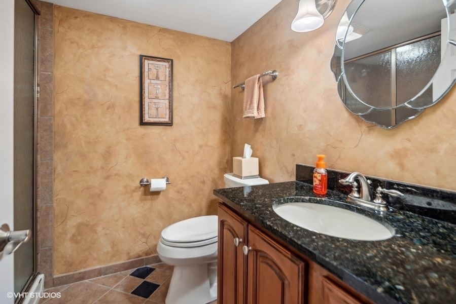 467 81st Street Burr Ridge, IL 60527 - Photo 38 of 45 a bathroom with a sink and a mirror