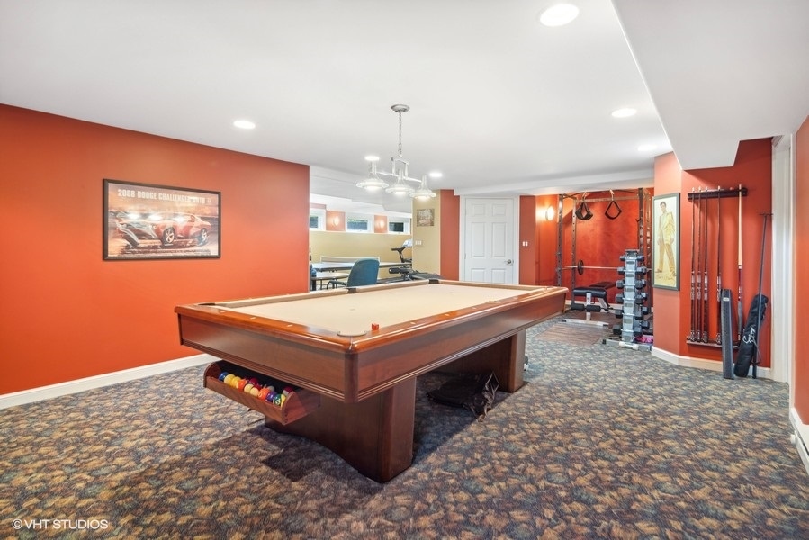 467 81st Street Burr Ridge, IL 60527 - Photo 39 of 45 a room with pool table and two windows