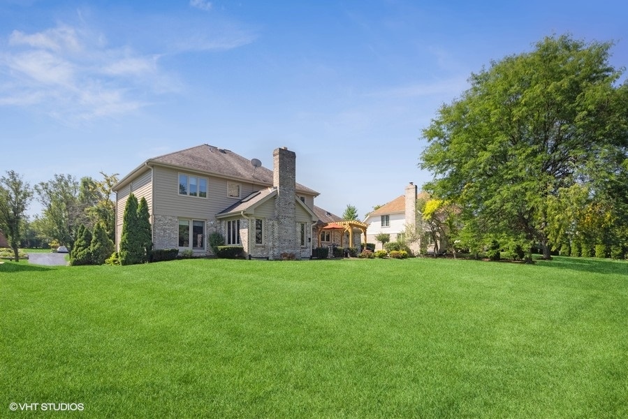 467 81st Street Burr Ridge, IL 60527 - Photo 45 of 45 a view of a big house with a big yard and large trees
