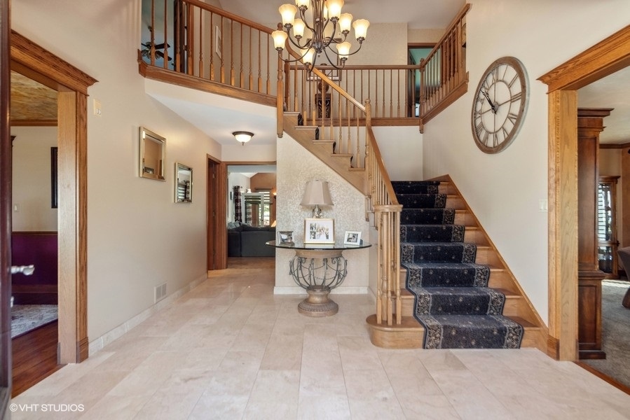 467 81st Street Burr Ridge, IL 60527 - Photo 6 of 45 a view of entryway with stairs and wooden floor