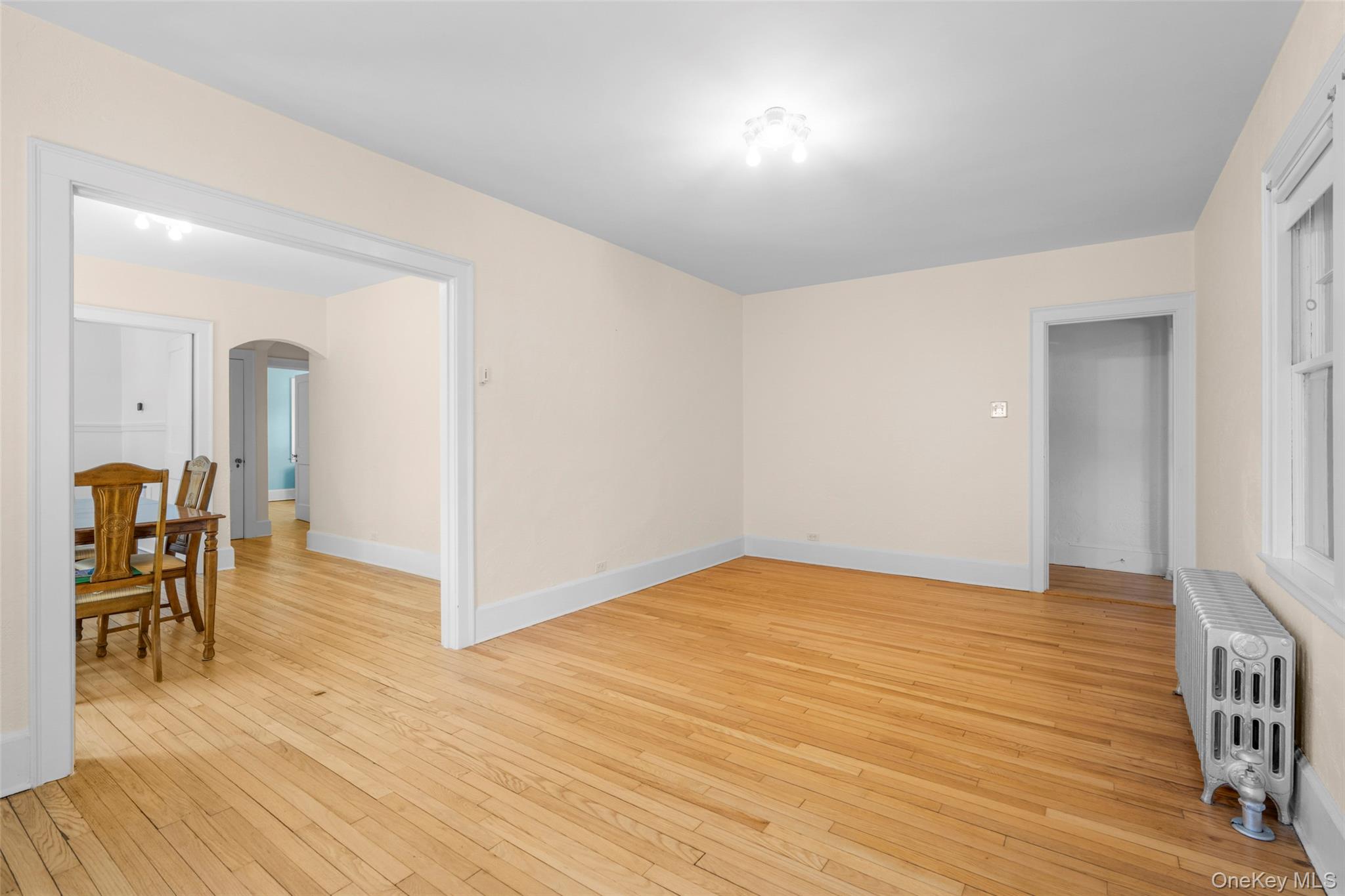 42 Crestview Street New Rochelle, NY 10801 - Photo 11 of 23 1st floor living room opens to office and dining room