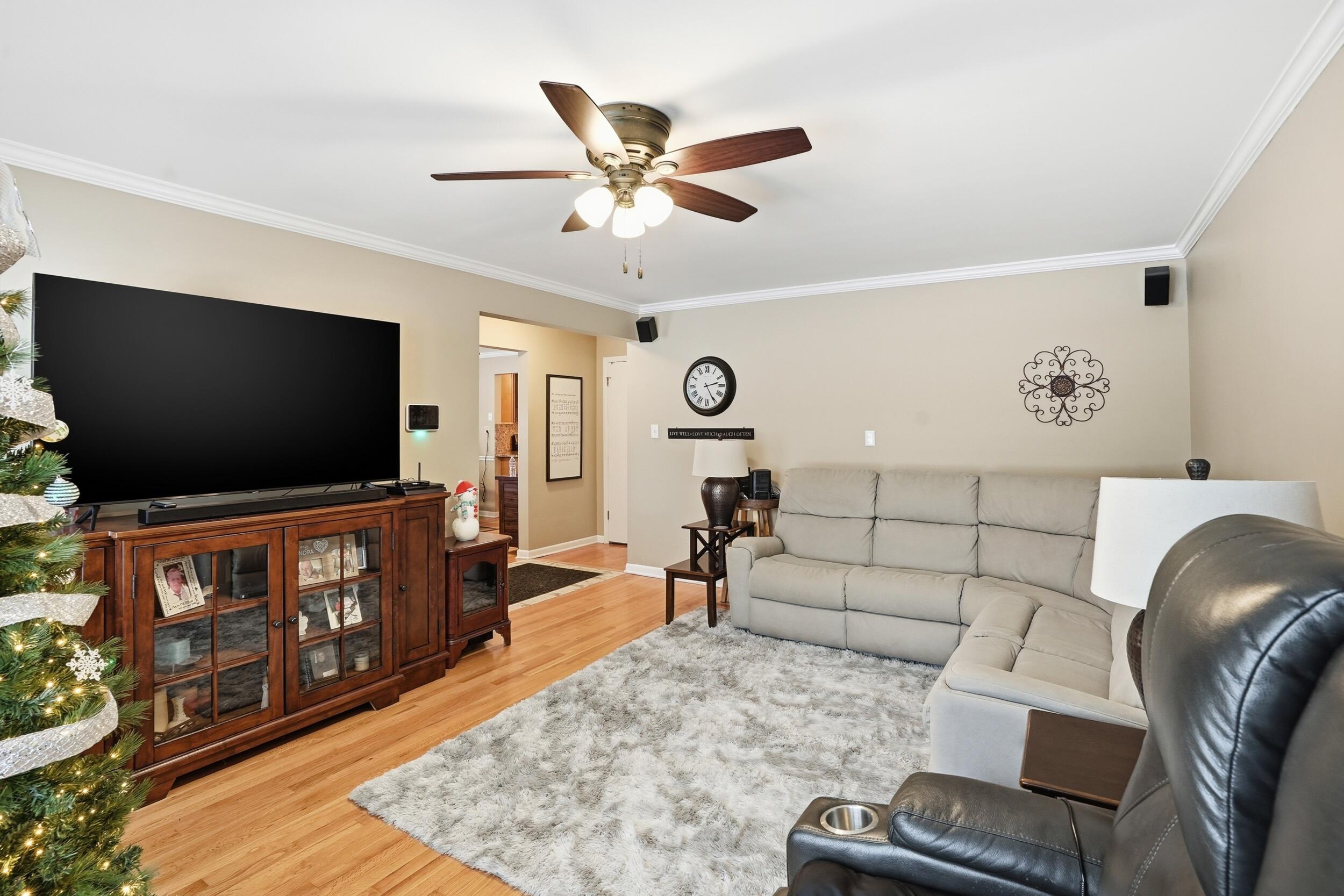 18 Timrick Drive Munster, IN 46321 - Photo 13 of 39 a living room with furniture and a flat screen tv