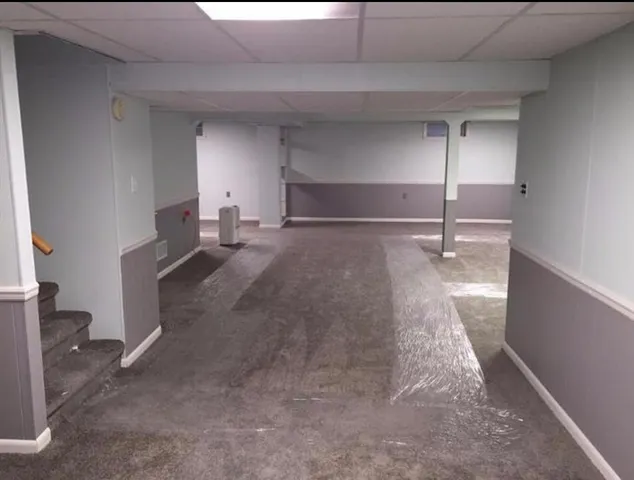 a view of a room with a staircase