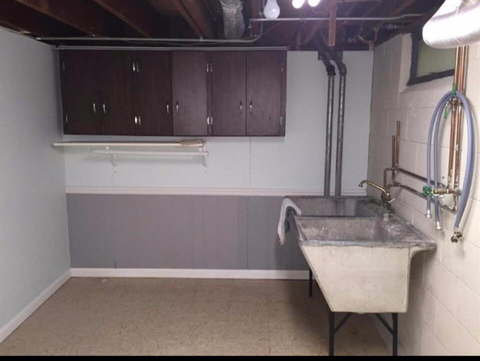 18 Timrick Drive Munster, IN 46321 - Photo 27 of 39 a bathroom with a sink and a mirror