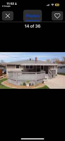 a view of living room with furniture and air hockey table