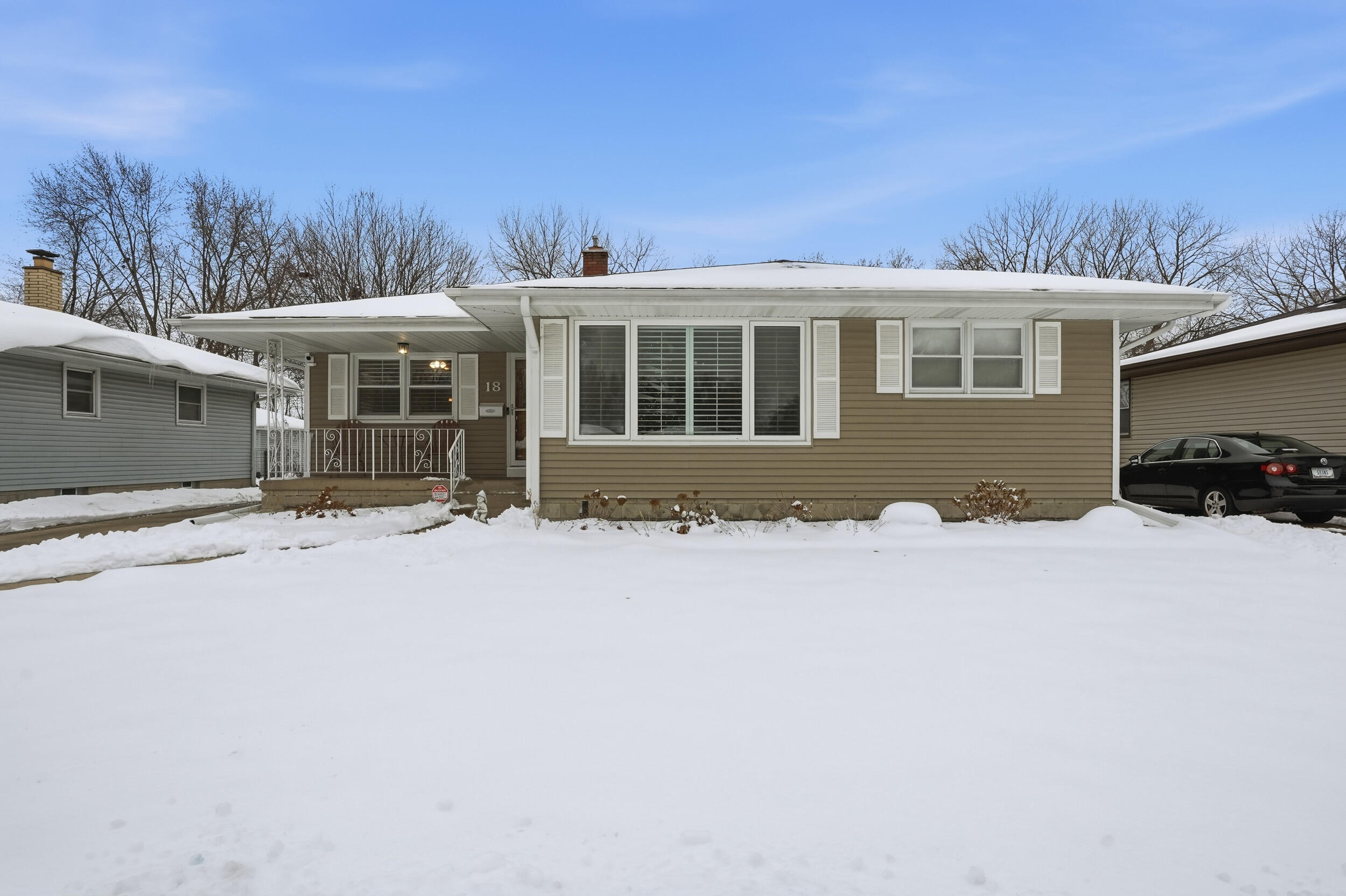 18 Timrick Drive Munster, IN 46321 - Photo 6 of 39 a front view of a house with a yard and garage