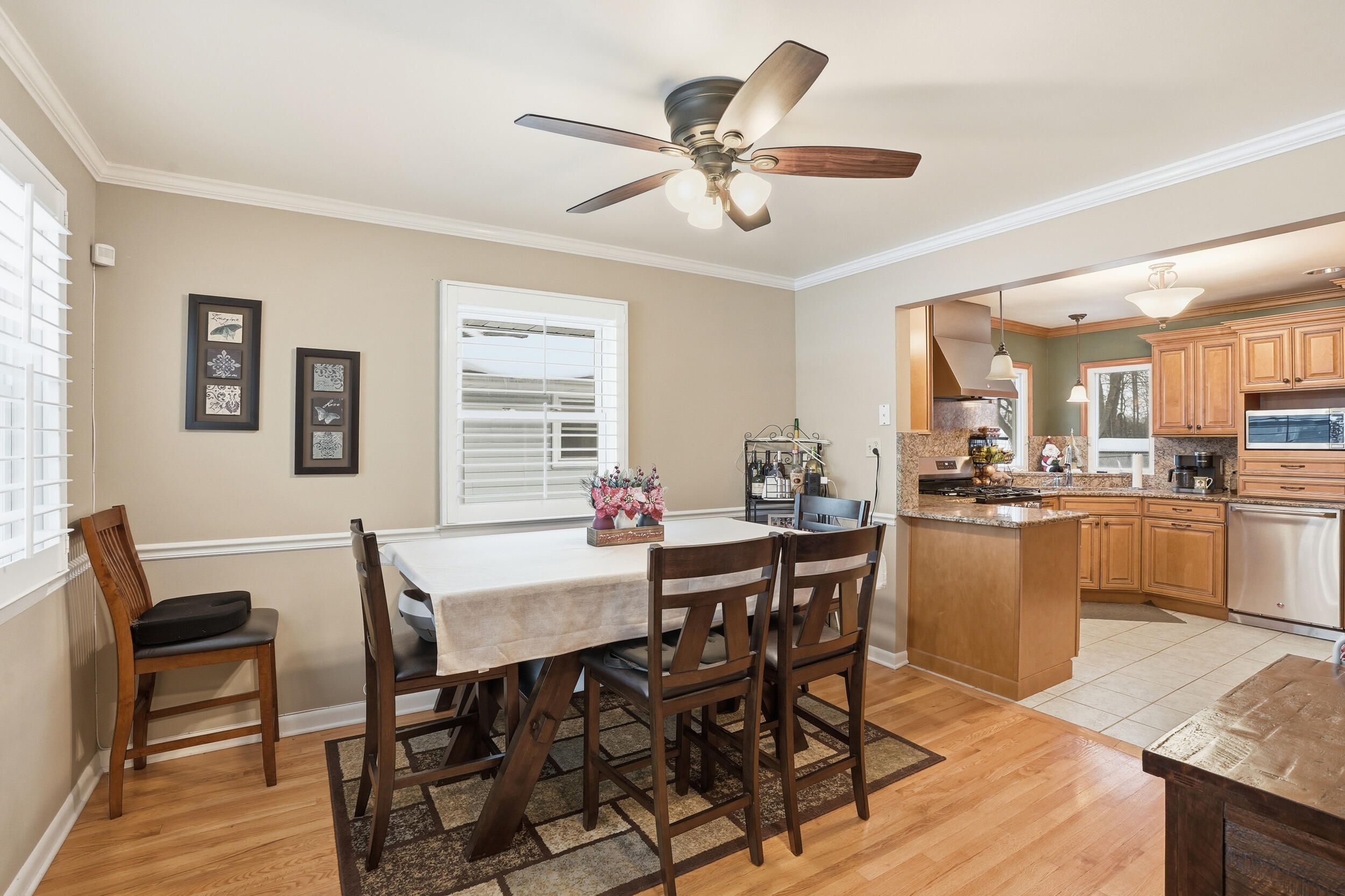 18 Timrick Drive Munster, IN 46321 - Photo 10 of 39 a view of a dining room with furniture and wooden floor