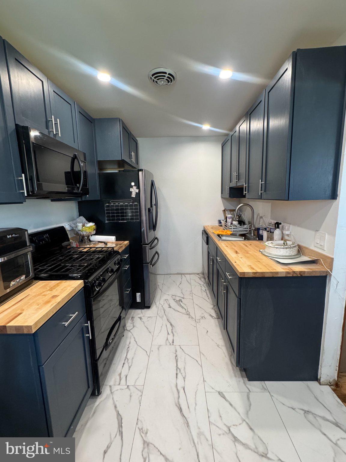 533 Tasker Avenue Norwood, PA 19074 - Photo 3 of 13 Sleek kitchen with modern finishes.
