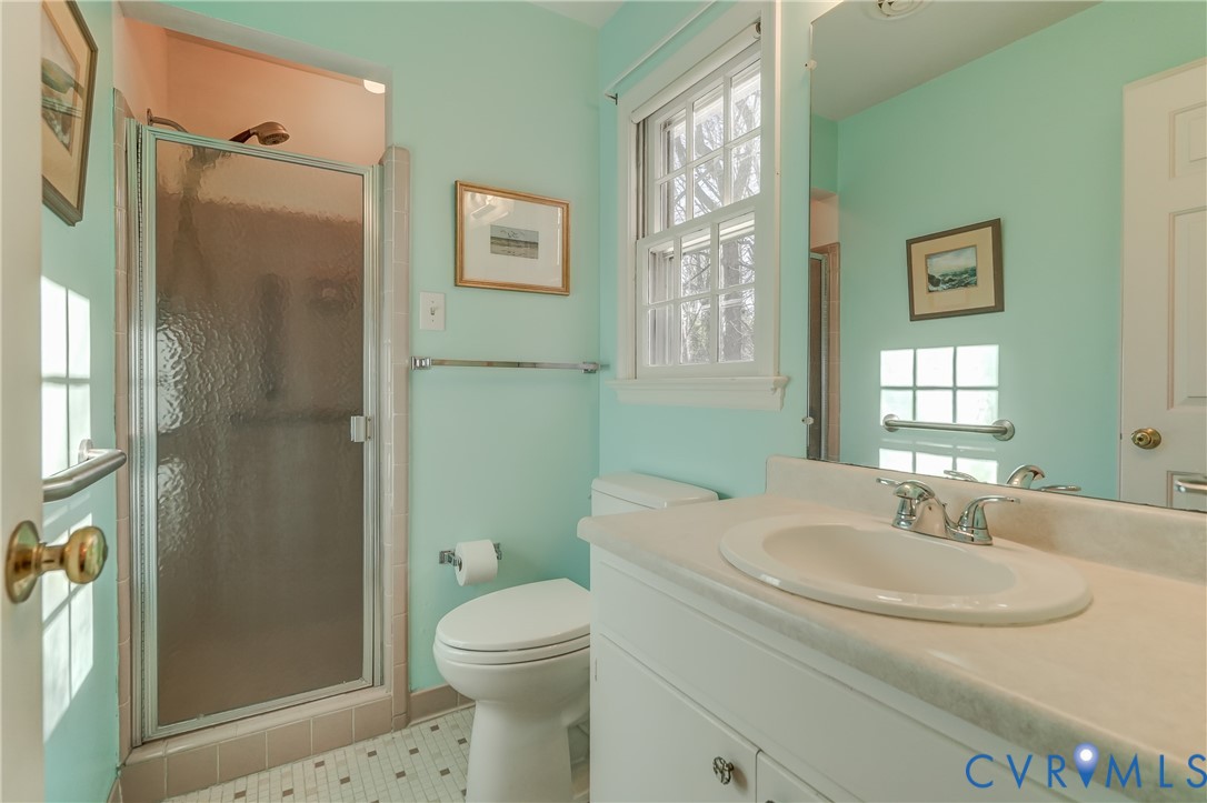 8623 Brown Summit Road North Chesterfield, VA 23235 - Photo 28 of 43 Primary bathroom with walk-in shower and tiled flo