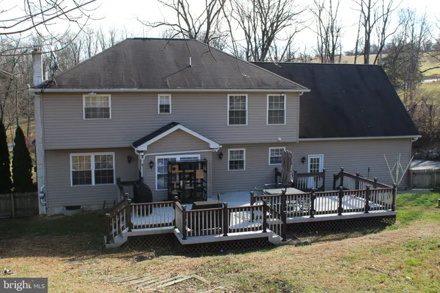 a view of a wooden fence