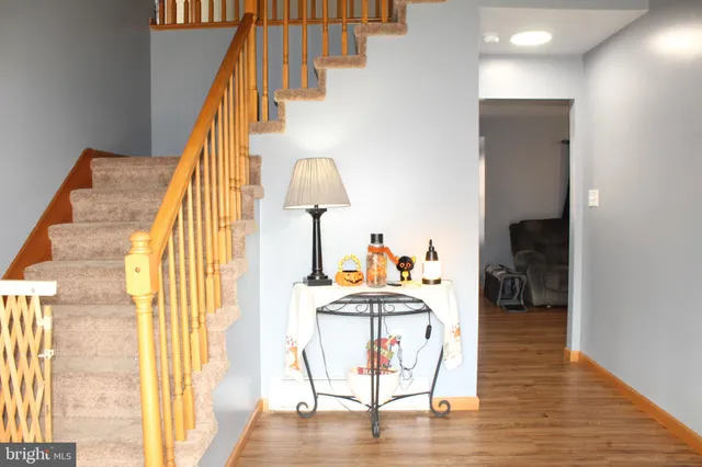 a view of entryway with wooden floor