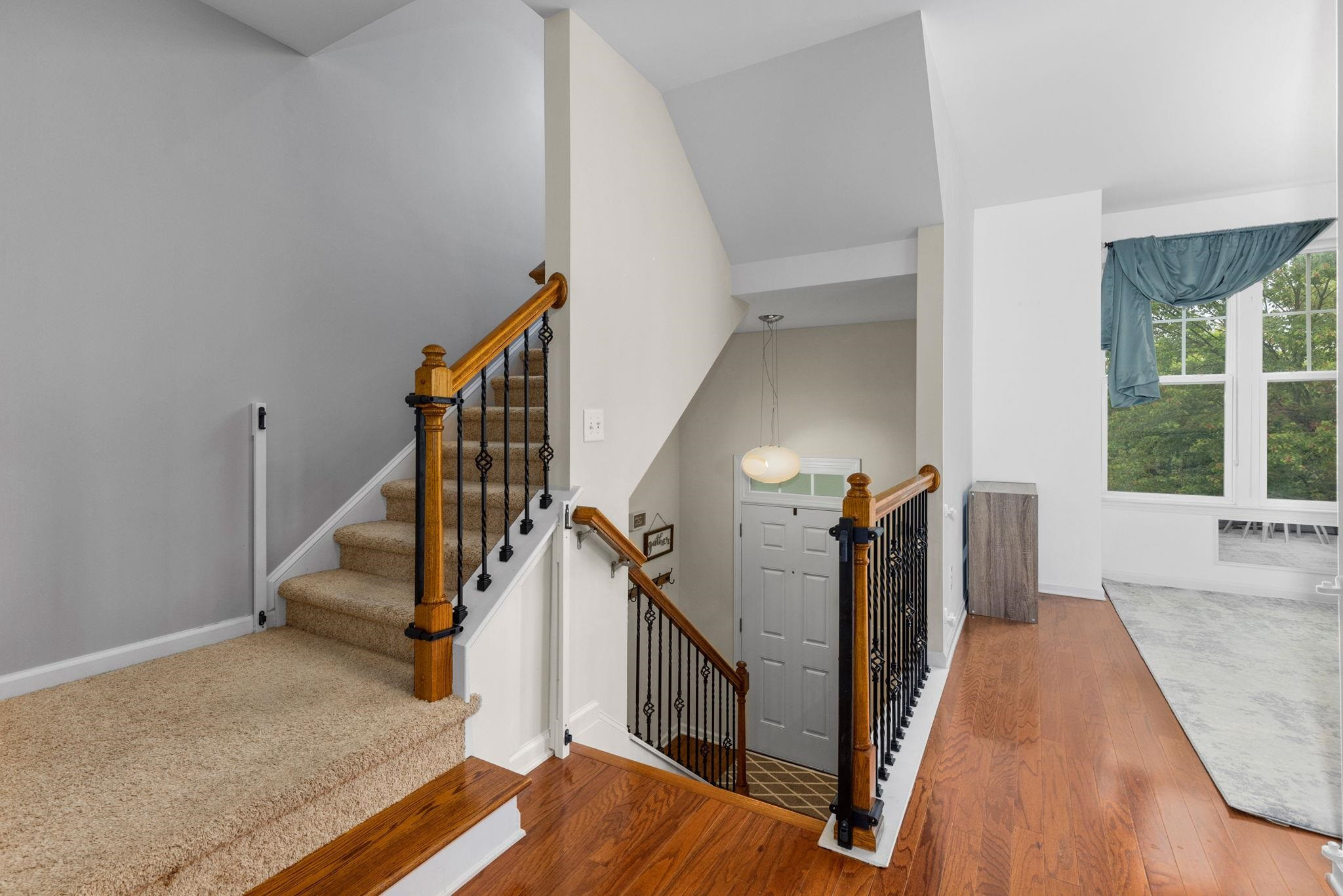 10115 Glen Autumn Road Raleigh, NC 27617 - Photo 29 of 55 Two-story entry w/Beautiful Hardwood Staircase decorated in Wrought Iron Rails Entry