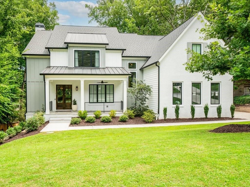 3191 Caldwell Road Northeast Brookhaven, GA 30341 - Photo 1 of 1 front view of a house with a yard