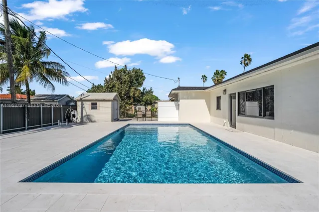 a house view with a backyard space