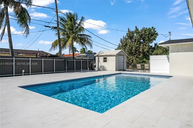 a view of a house with a swimming pool