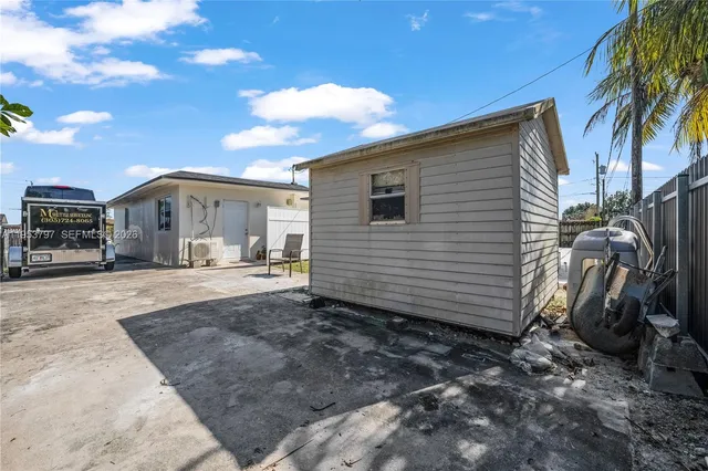 a house view with a garden space