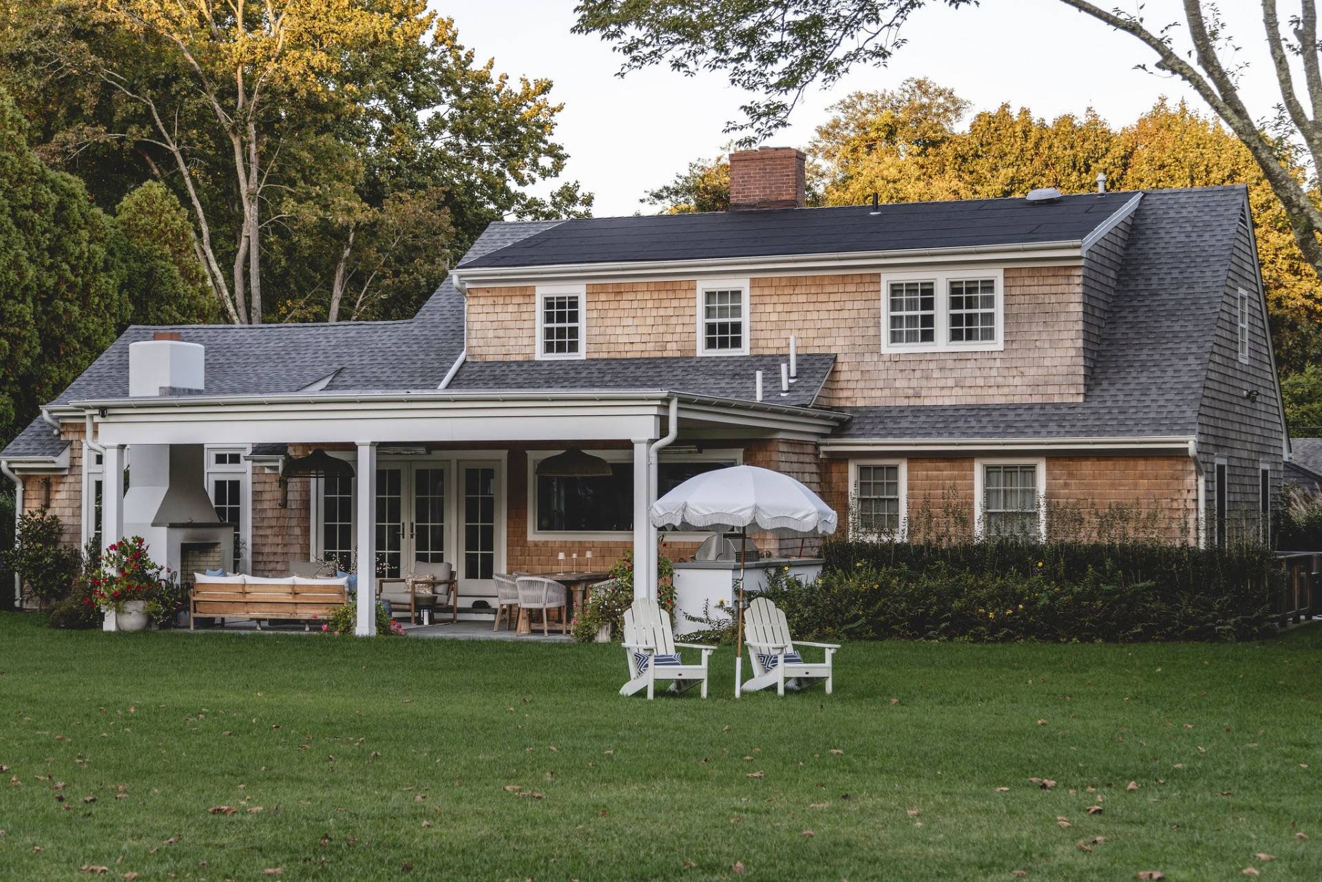 29 Maple Lane East Hampton, NY 11937 - Photo 44 of 44 a front view of a house with a garden