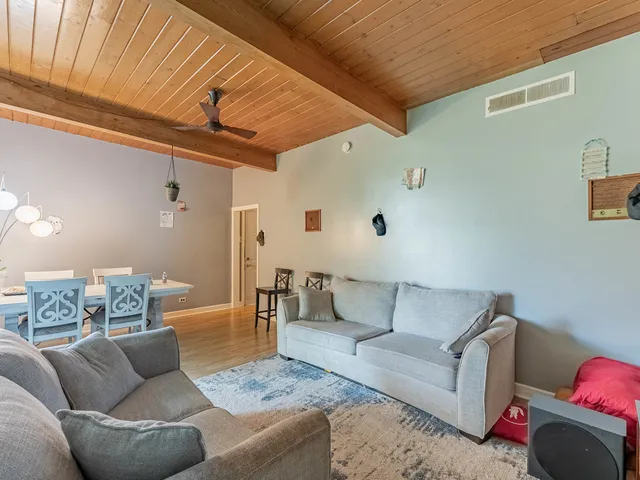 a living room with furniture and a couch