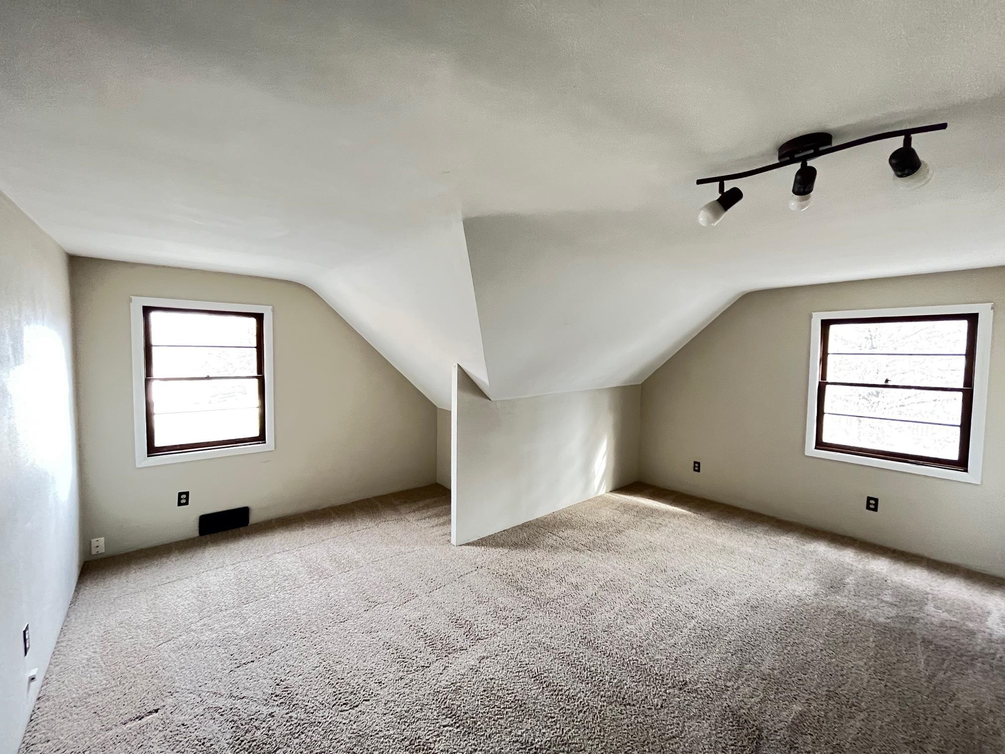 13954 Dorr Road Rockton, IL 61072 - Photo 12 of 21 an empty room with windows and closet