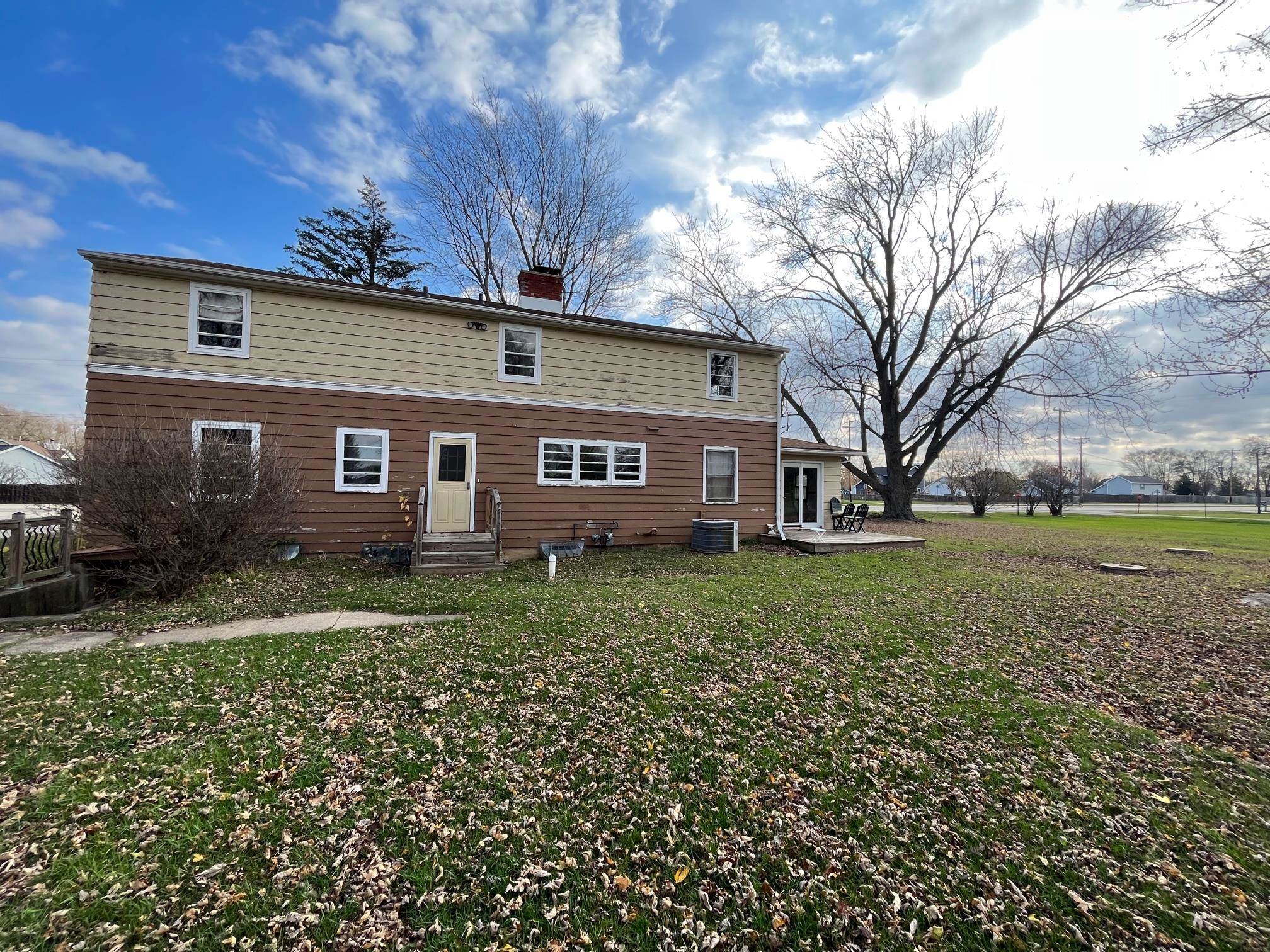 13954 Dorr Road Rockton, IL 61072 - Photo 3 of 21 a view of a house with a yard