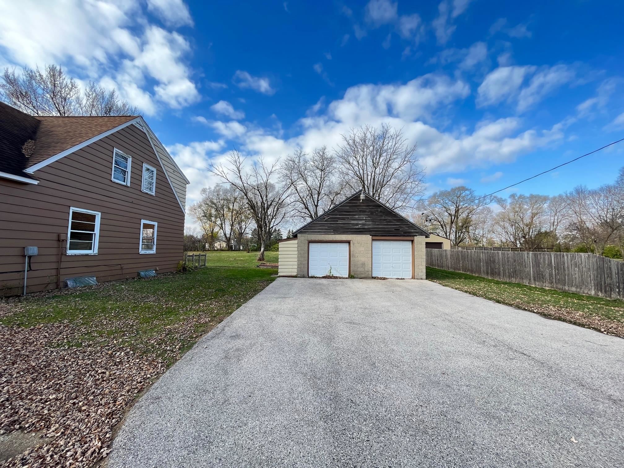 13954 Dorr Road Rockton, IL 61072 - Photo 4 of 21 a view of a house with a yard