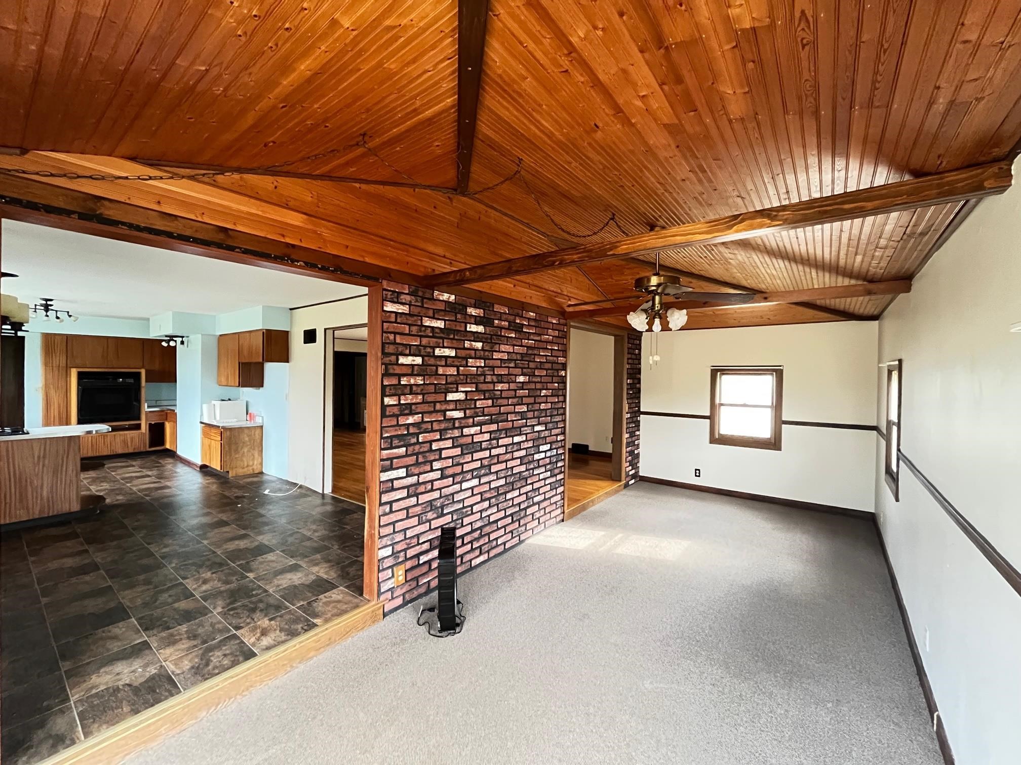 13954 Dorr Road Rockton, IL 61072 - Photo 6 of 21 a view of a livingroom with fireplace and window