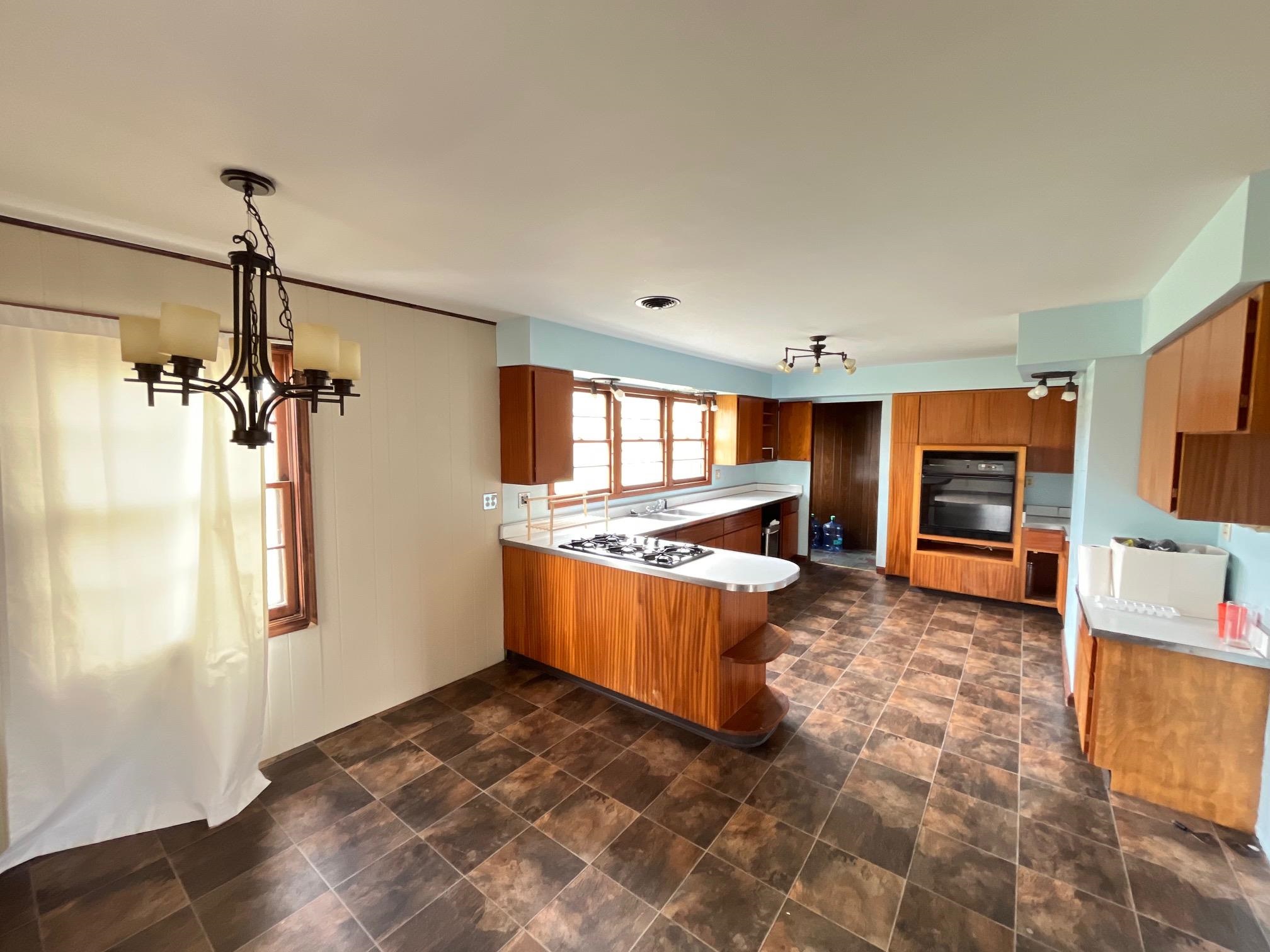 13954 Dorr Road Rockton, IL 61072 - Photo 7 of 21 a large living room with a couch and a flat screen tv