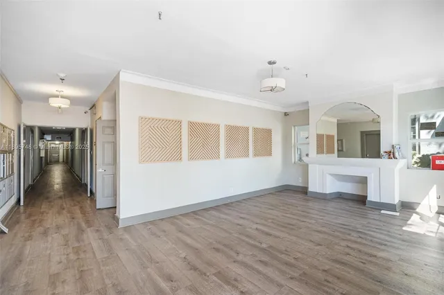 a view of an empty room and window