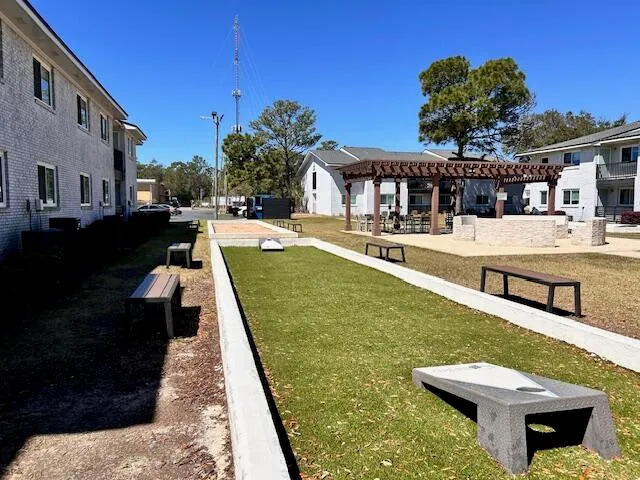 a view of a swimming pool with a patio