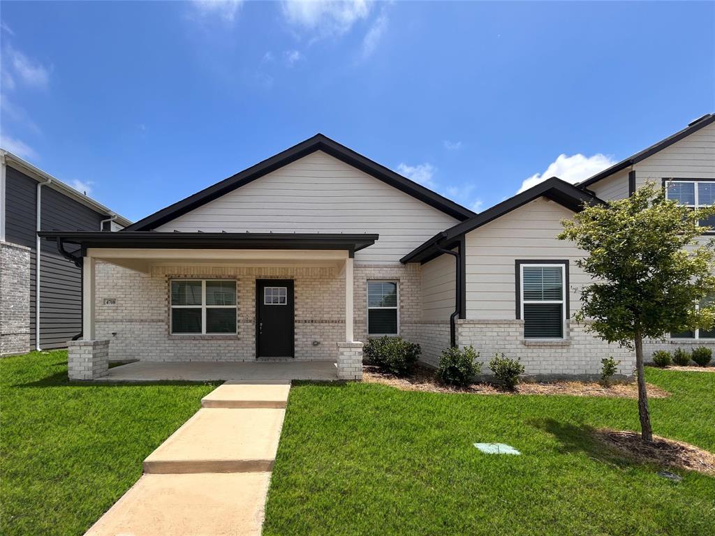 front view of house with a yard